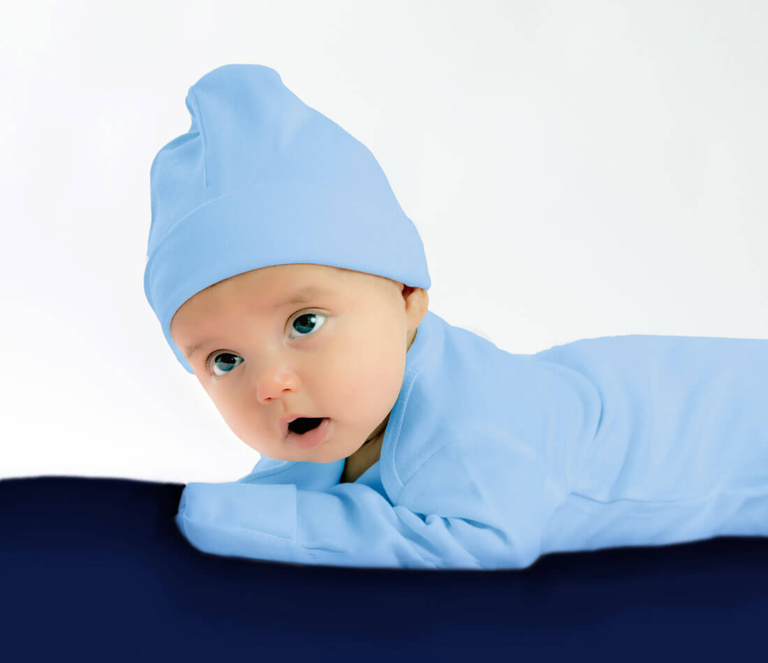 baby wearing blue beanie hat and blue onesie